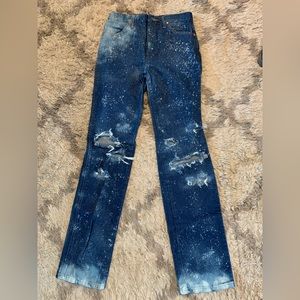 Custom made wrangler jeans, I bleached and ripped them myself.